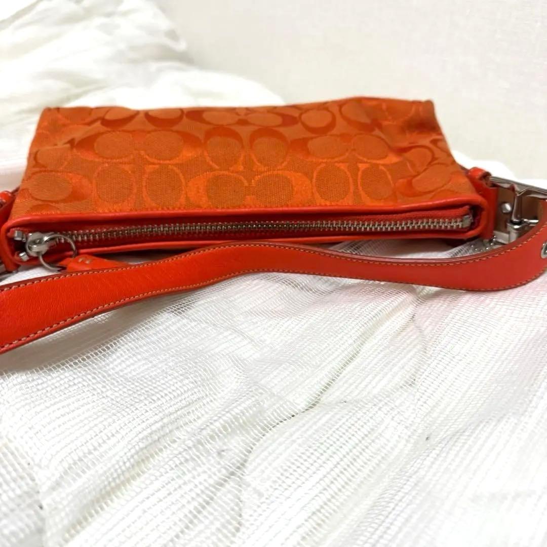 COACH アクセサリーポーチ　ワンショルダー　シグネチャー　オレンジ