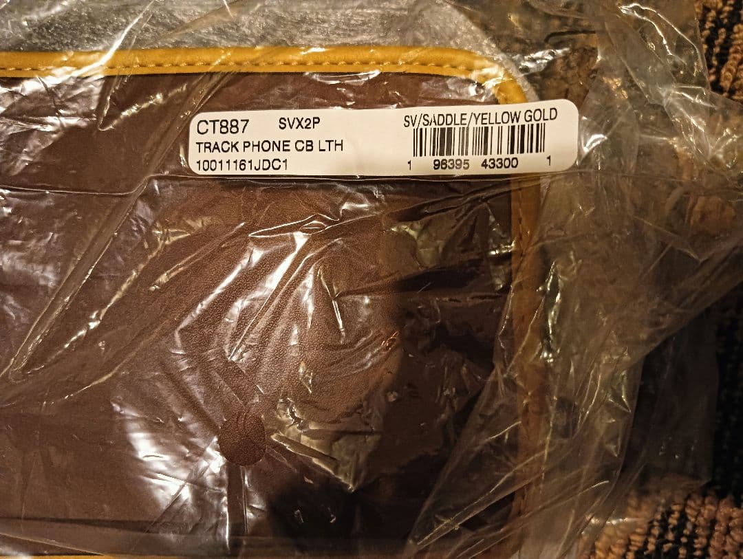 レーサーフォーン　クロスボディ　バッグ　coach 新品未使用　レザー　ブラウン