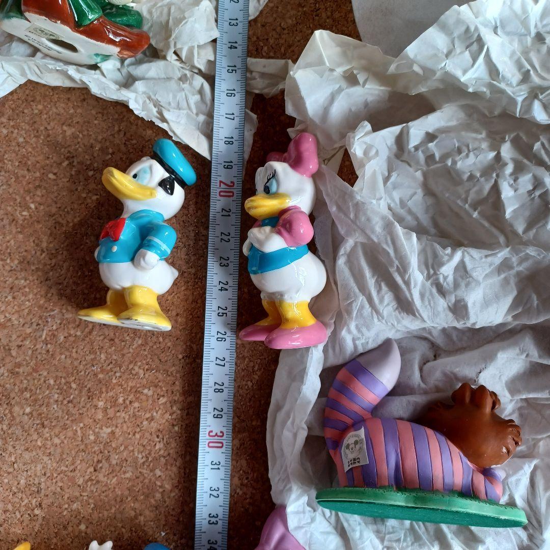 Disney　置物　不思議の国のアリス　デイジー　チェシャ猫　白うさぎ　プルート