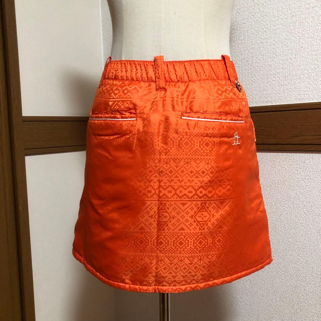 セットアップ マンシングウェア 中綿 パーカー スカート オレンジ 総柄 M