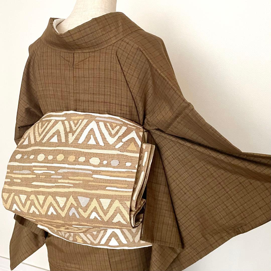 シクラメン様リクエストしつけ付き 雪輪飛び柄小紋 100亀甲絣十日町紬と洒落袋帯