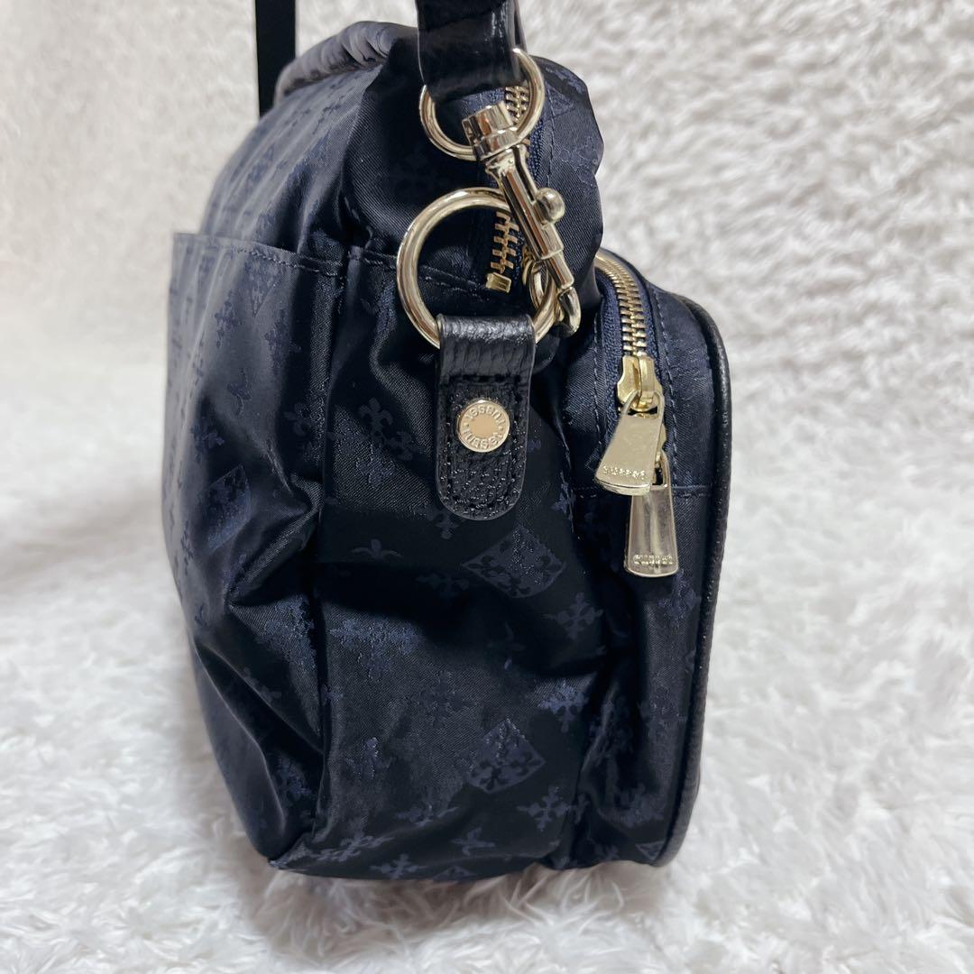 未使用品✨russet ショルダーバッグ　モノグラム　総柄　紺　ロゴ金具　保存袋