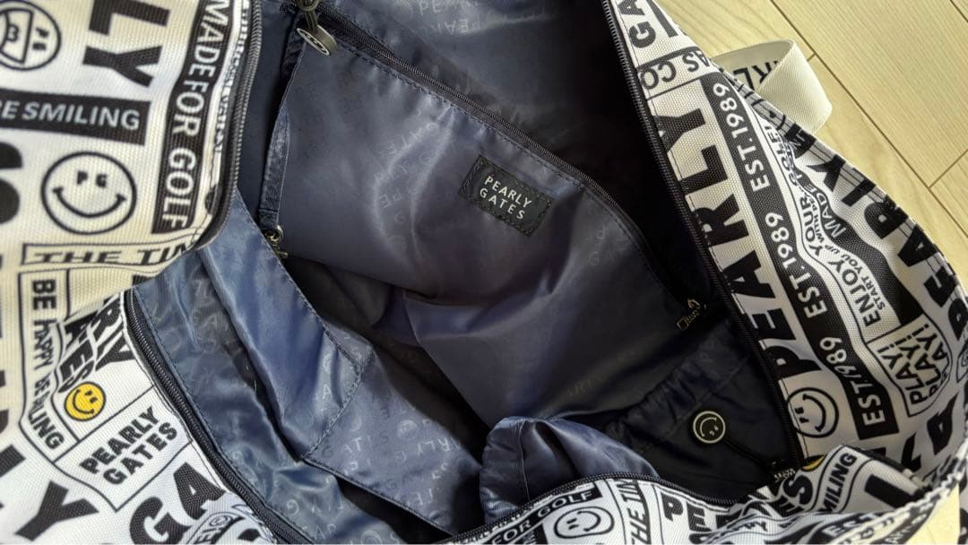 パーリーゲイツ　ロッカーバック　ニュースペーパー柄