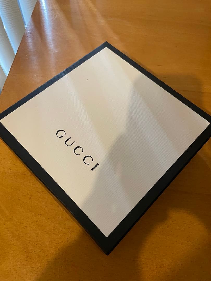 GUCCI ブラックレザーベルト GGロゴ付き